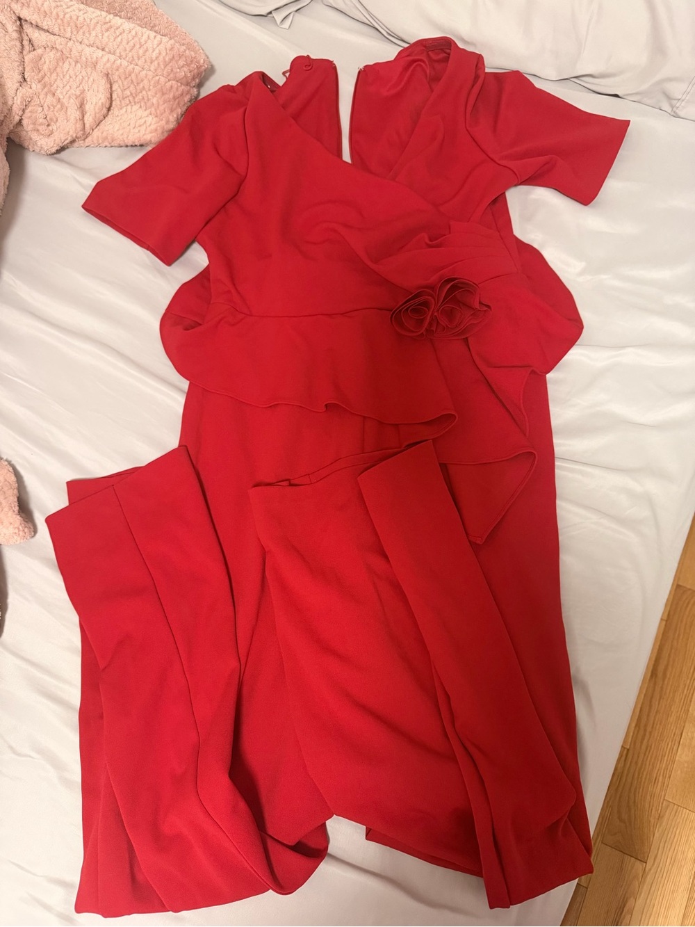 Elegant Red Women's Peplum Jumpsuit with Floral Waist Detail